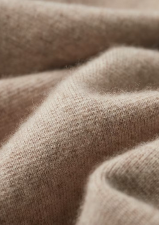 Cárdigan polo con cremallera de lana merino extrafina
