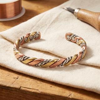 Pulsera de cobre trenzada en tres tonos
